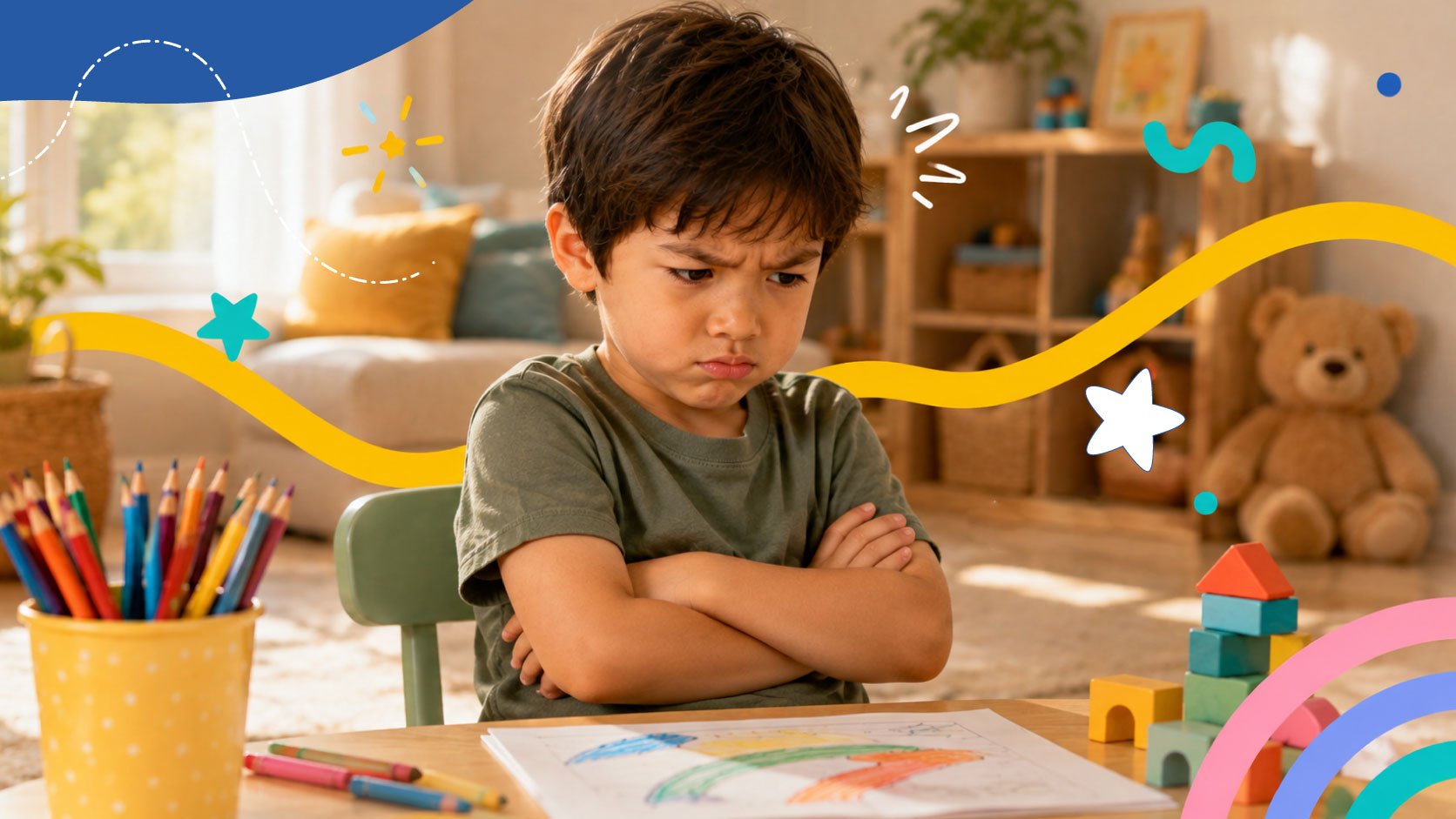 A boy with folded arms beside a coloring page and crayons